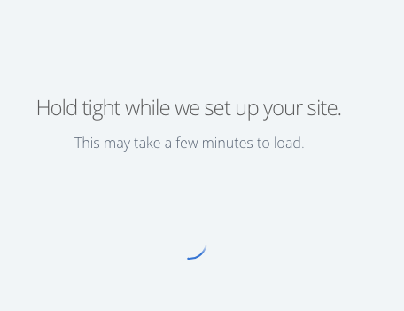 The message This may take a few minutes to load appears when setting up on Bluehost