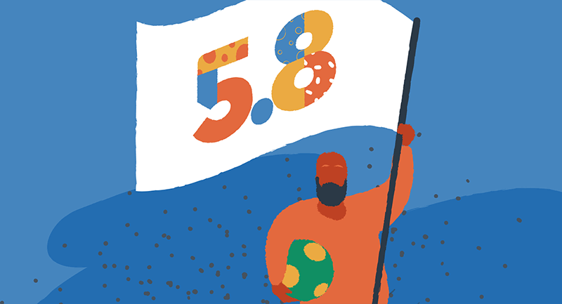 A man holds a flag with the number 5 point 8