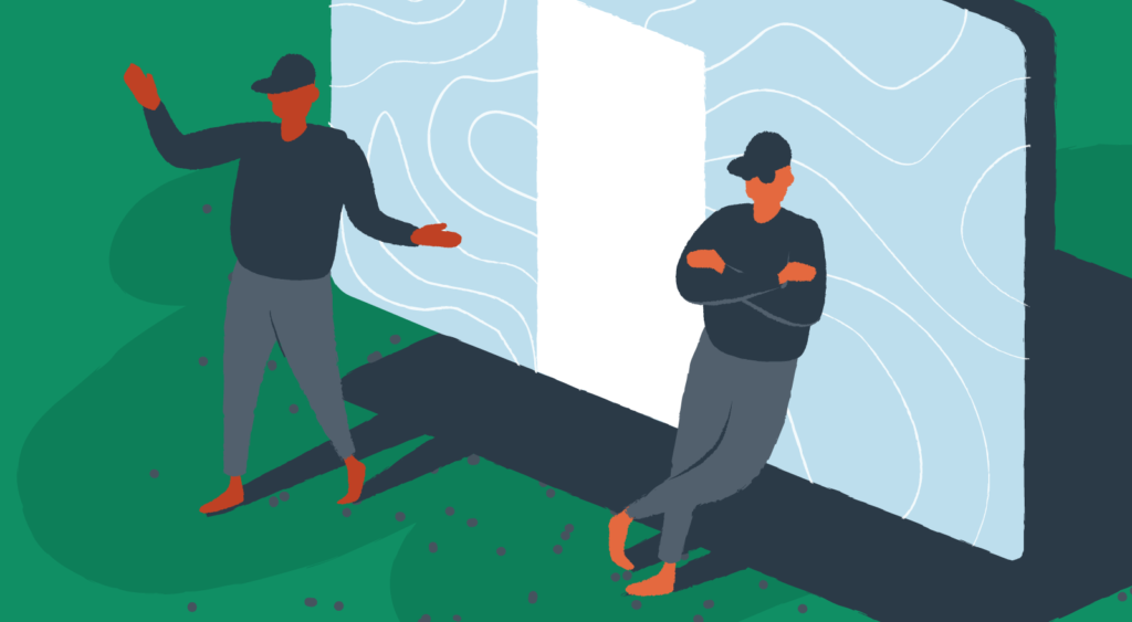 Two security guards monitor a website.