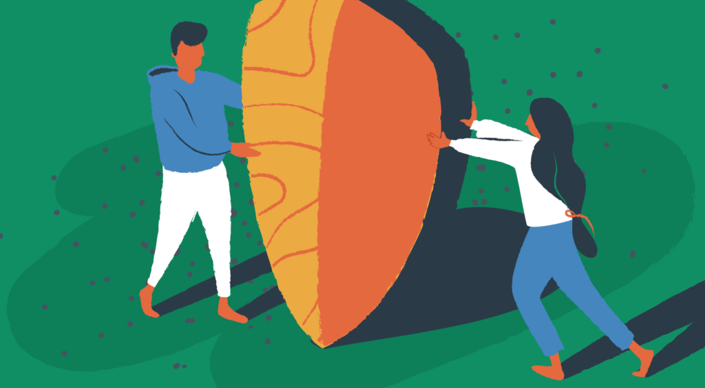 Two people hold up a large shield over a green background.