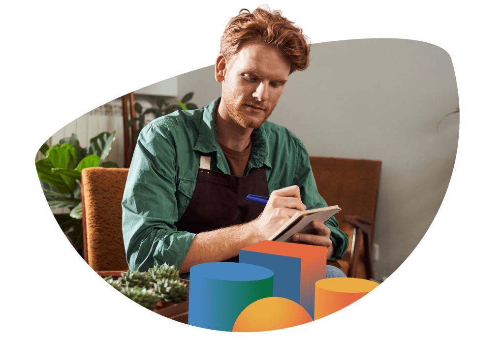 A small business owner works on their store.