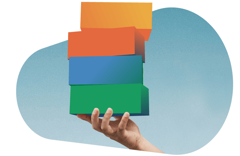 A hand holds a stack of multiple boxes